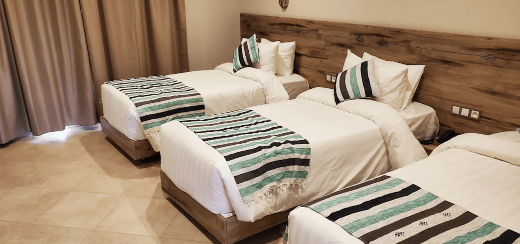 Hôtel Bladi Palace Taghit – vue extérieure au pied des dunes