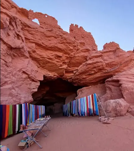 Entrance to the Ighrizer cave carved into the soft sandstone